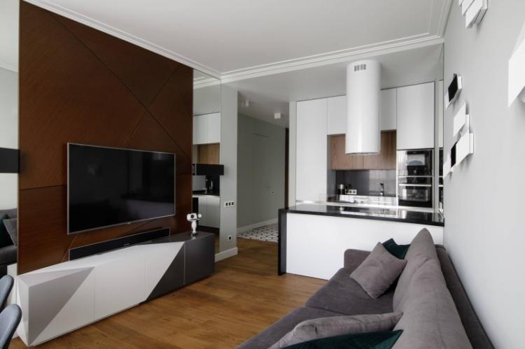 Cuisine-salon blanche - photo de design d'intérieur