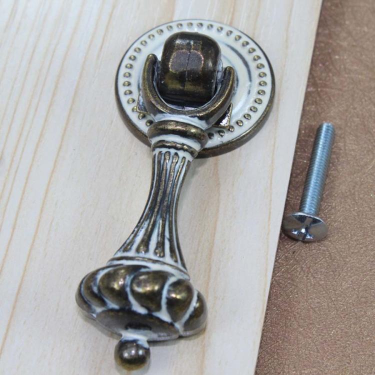 Poignées tombantes - Poignées de meubles