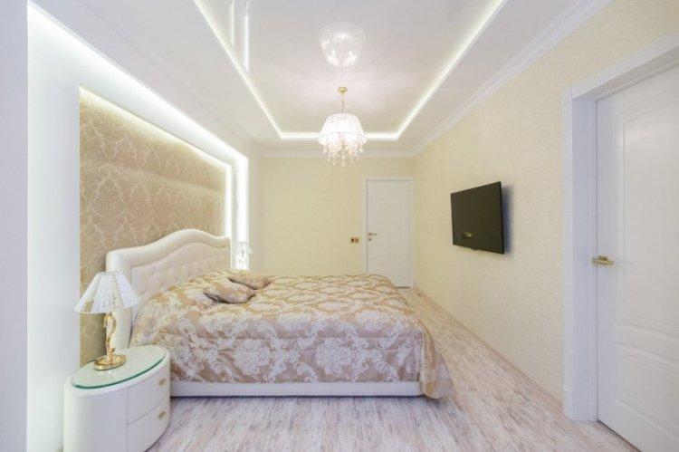 Éclairage caché au plafond tendu