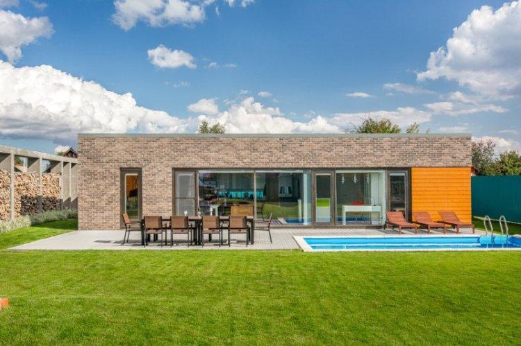 Maison à un étage avec toit plat - projets et photos