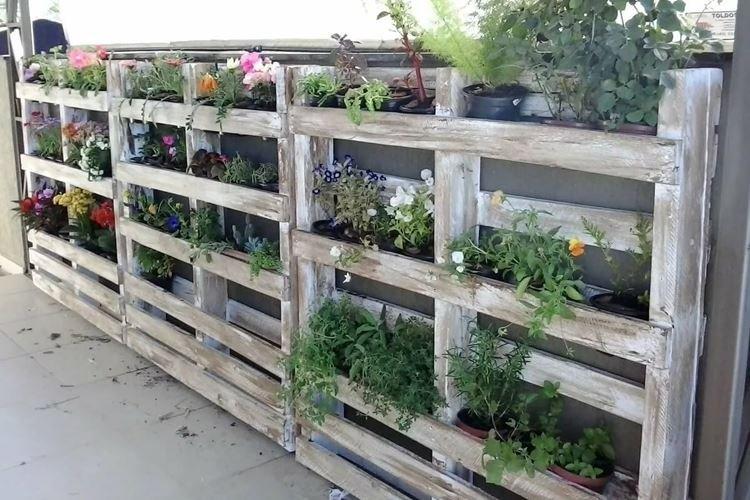 Clôture en palettes - Mobilier de jardin en palettes pour donner une photo