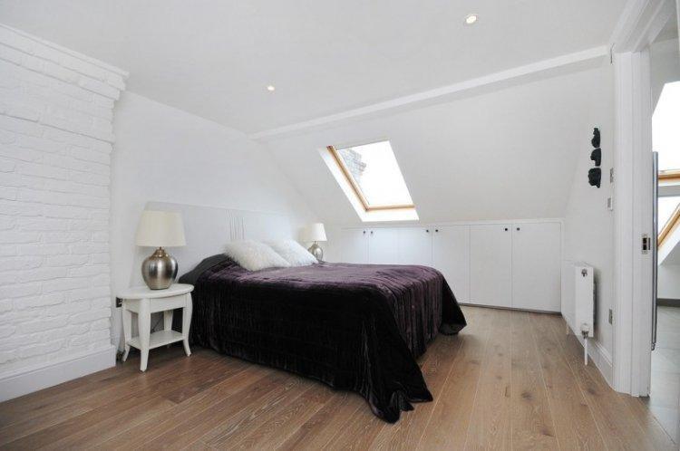 Chambre mansardée de style scandinave - photo de design d'intérieur